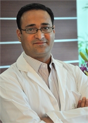 Dr  Manik  Sharma